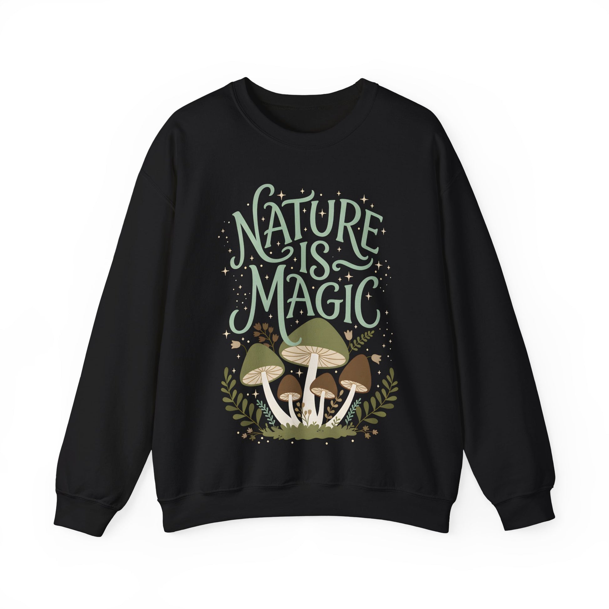 Front view of black unisex sweatshirt with large “Nature Is Magic” design, illustrated forest mushrooms and green leaves creating a cozy nature-inspired aesthetic.