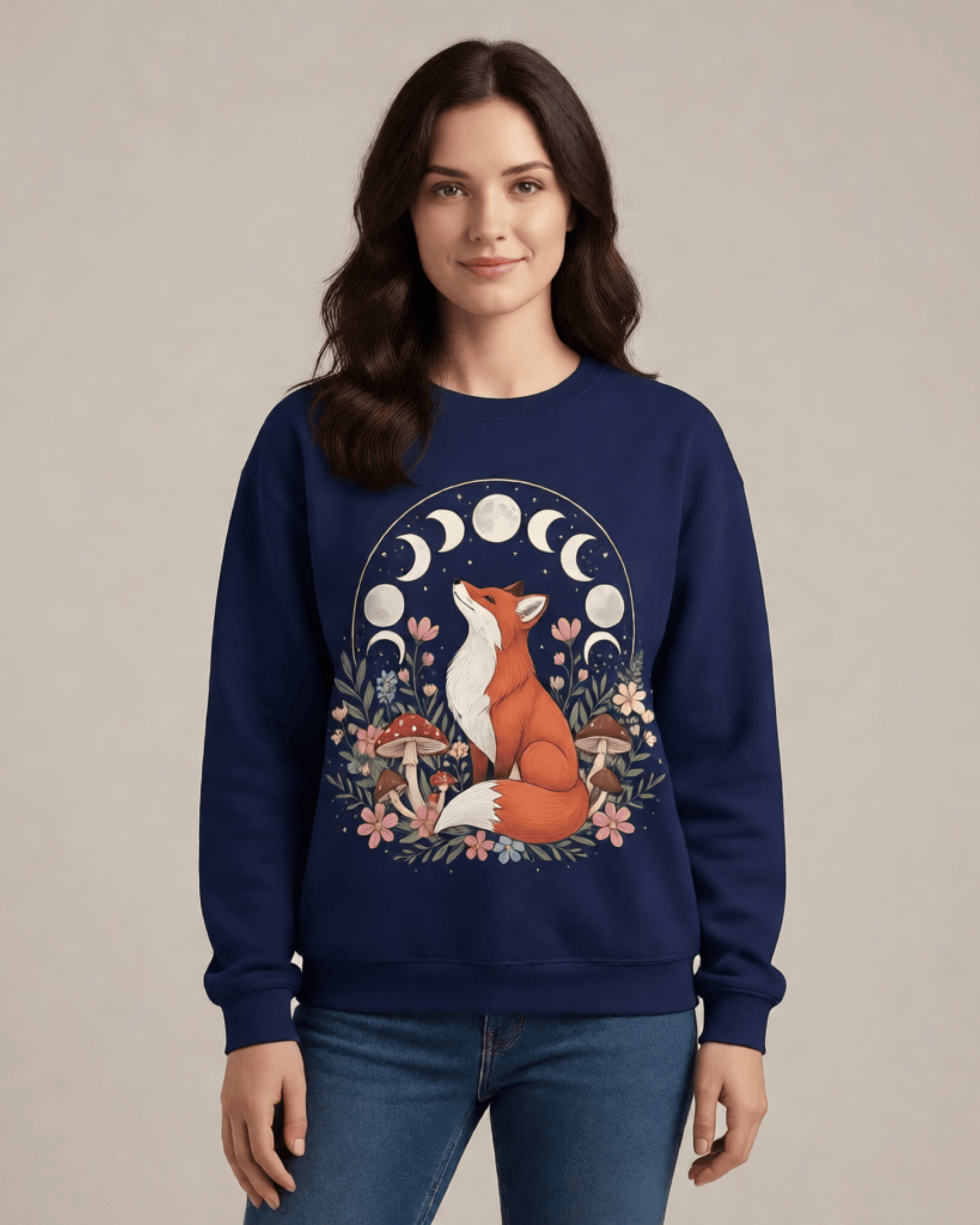 Front view of the navy blue Fox and Moon Phases sweatshirt on a model. The detailed cottagecore design features a beautiful fox, mushrooms, and a full lunar cycle graphic.