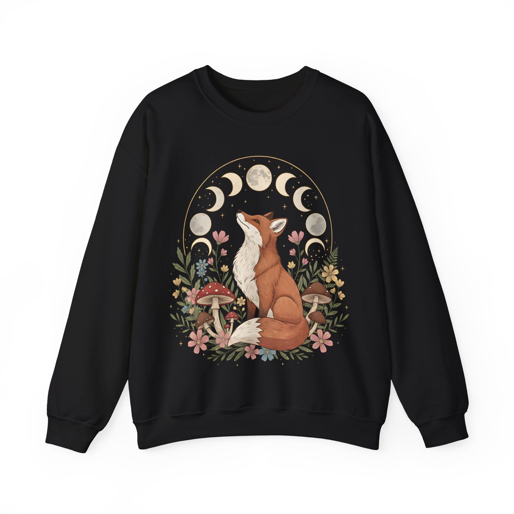 Unisex black cottagecore fox and moon phases sweatshirt laid flat on a white background, highlighting the whimsical forest design with mushrooms, flowers and a full lunar cycle above the fox.