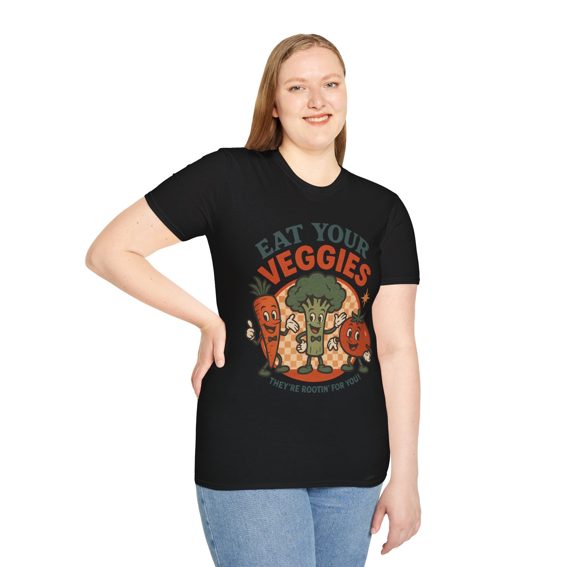 Plus size woman standing with hand on hip in a black “Eat Your Veggies” Vegan Vegetarian Vegetable Tshirt, showing the relaxed unisex fit and playful veggie design.