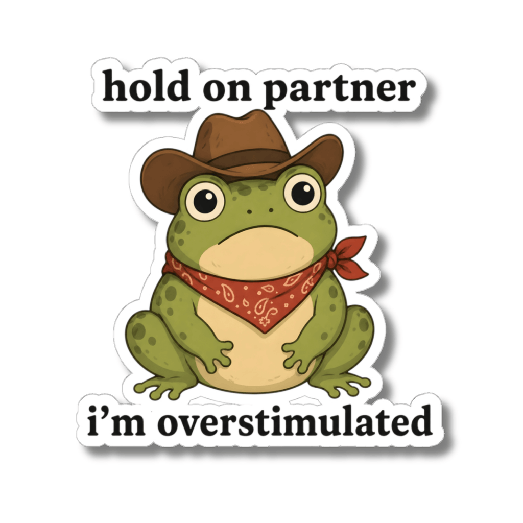 A kiss-cut sticker featuring a cartoon green frog wearing a brown cowboy hat and a red paisley bandana, with the text 'hold on partner' above and 'i'm overstimulated' below, shown on a plain white background.